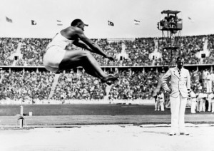 Jesse Owens winning the Long Jump event at the 1936 games in Berlin.