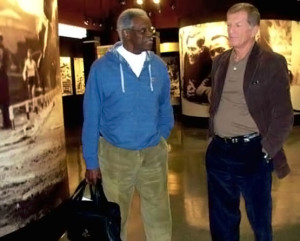 Ralph Boston (left) with James Pinion, touring the Jesse Owens Museum in Oakville. In 1960 Mr. Boston broke Owens’ world record distance in the long jump event, held by Owens for 25 years.